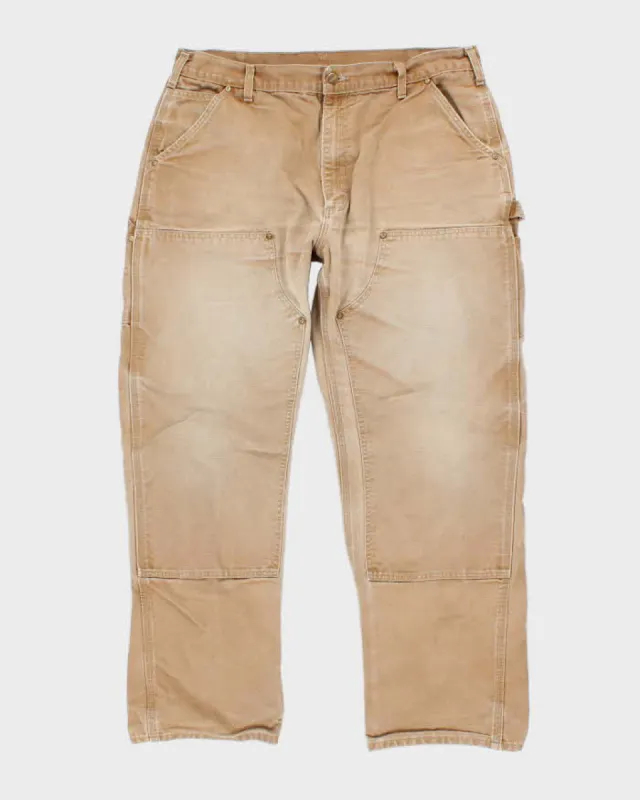 Vintage Carhartt Double Knee Faded Beige Workwear Trousers - W36 L30 sold by Rokit
