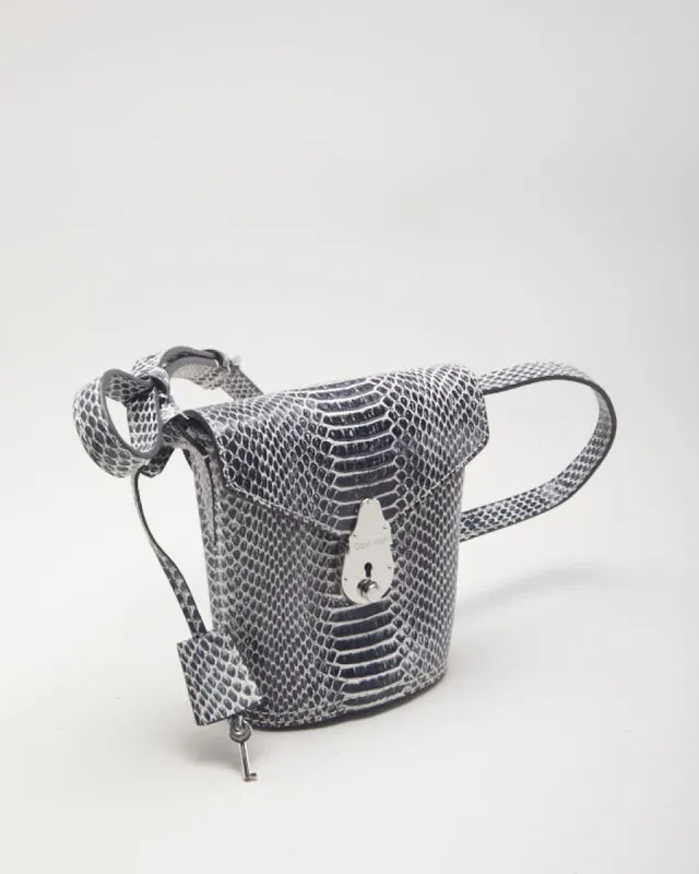 Calvin Klein Snake Print Mini Bucket Bag made by Calvin Klein