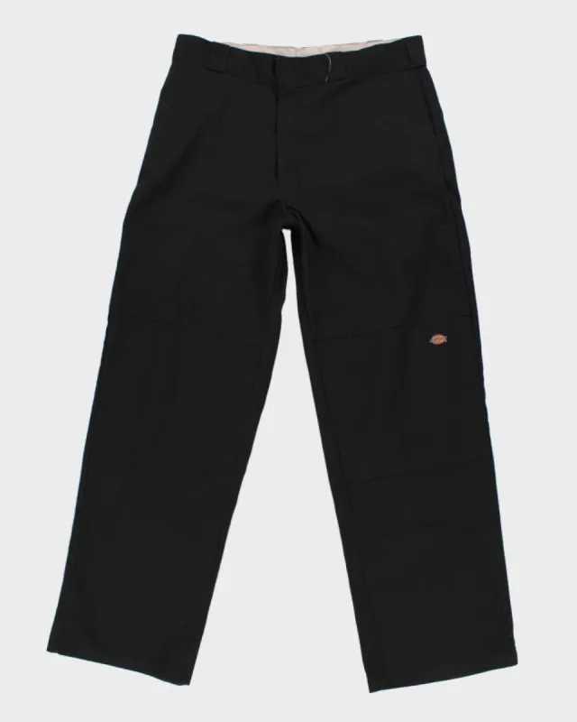 Vintage Dickies Black Loose Fit Trousers - W34 L32 sold by Rokit