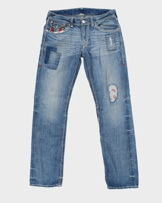 Y2K 00s True Religion Medium Wash Patchwork Jeans - W33 sold by Rokit