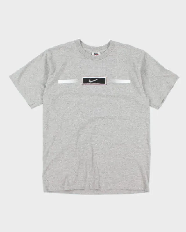 Vintage 90's Nike Centre Logo T-Shirt - M sold by Rokit