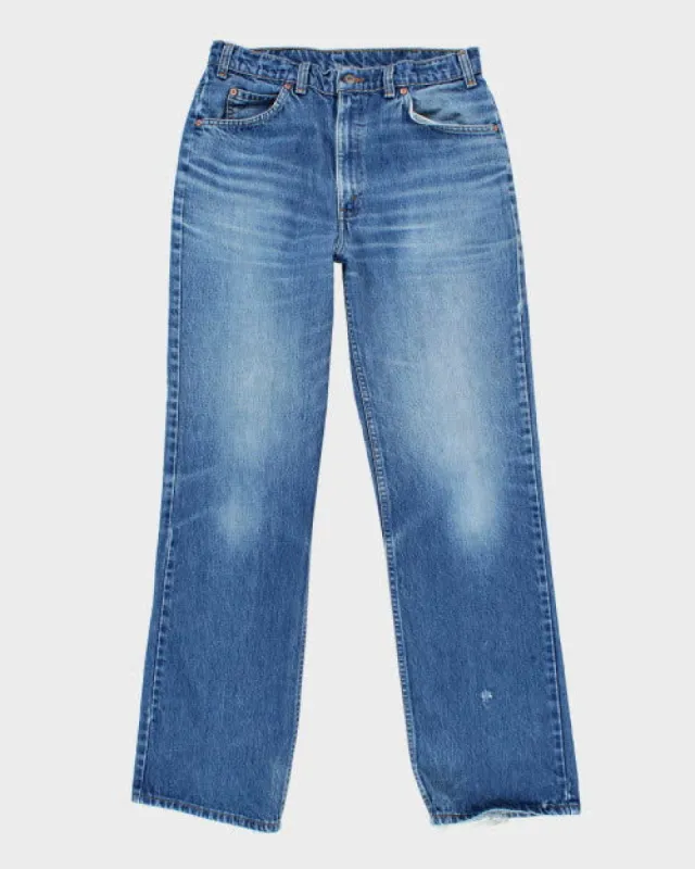 Vintage Levi's 619 Orange Tab Jeans - W32 L33 sold by Rokit