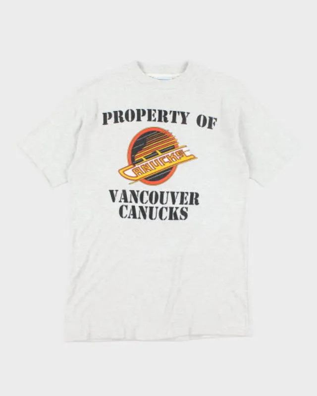 Vintage 90's Vancouver Canucks Graphic T-Shirt - M sold by Rokit