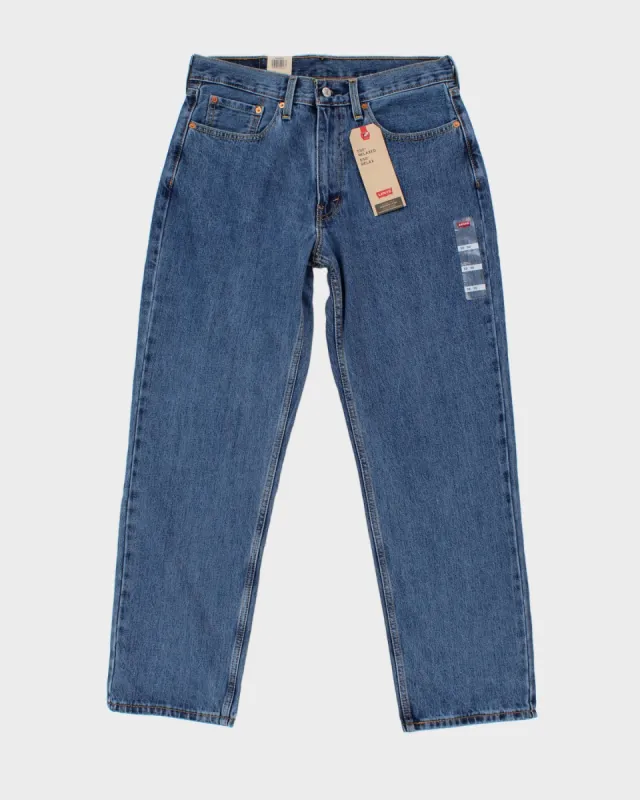 00s Lee Medium Wash Blue Denim Jeans - W34 L29 sold by Rokit