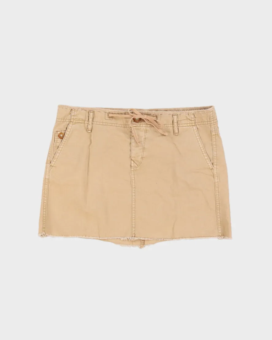 Y2K 00s Beige Cargo Mini Skirt With Raw Hem - M/L sold by Rokit