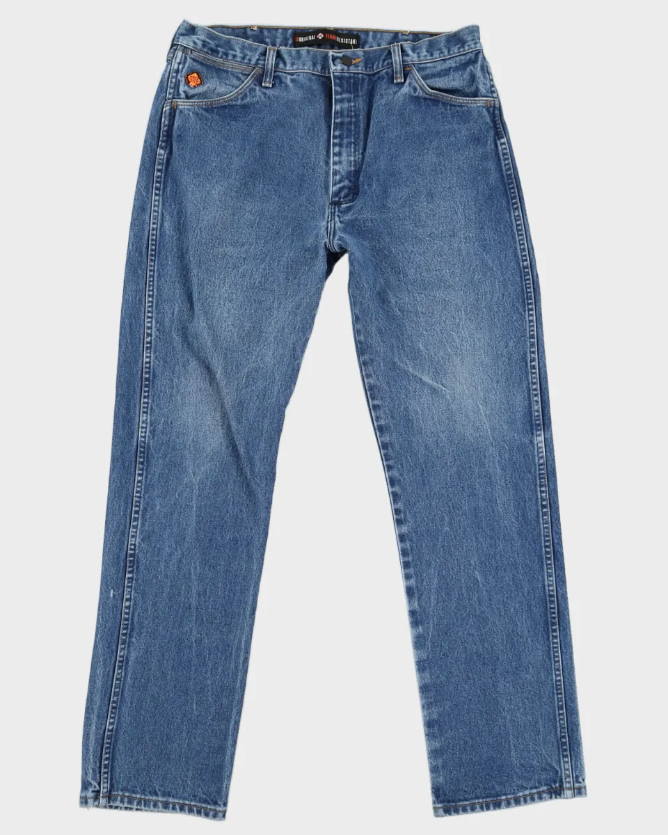 Vintage 00s Wrangler Medium Wash Flame Resistant Denim Jeans - W36 L34 sold by Rokit