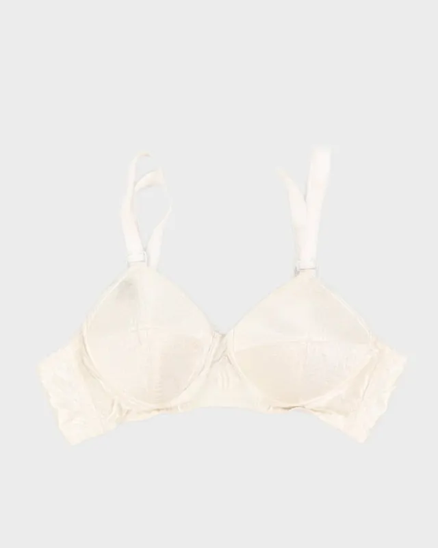 True Vintage 1950s White Bullet Bra marked 32B - XS sold by Rokit