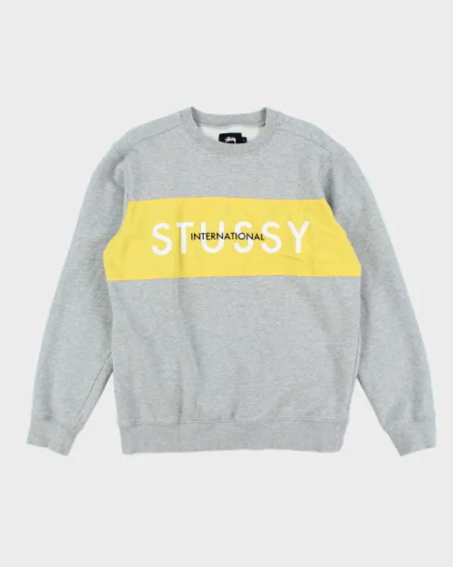 Vintage Stussy International Chest Stripe Sweatshirt - L sold by Rokit