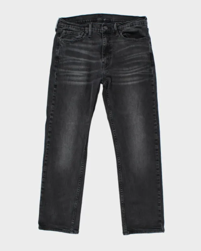 Vintage Levi's 513 Dark Wash Denim Jeans - W32 L27 sold by Rokit