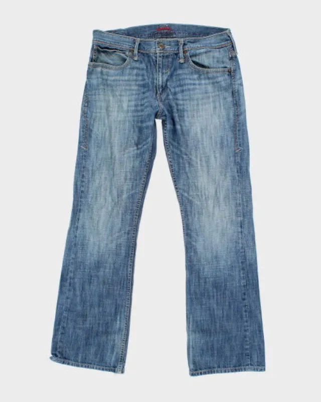 Vintage Levi's Straight Fit Medium Wash Denim Jeans - W34 L31 sold by Rokit