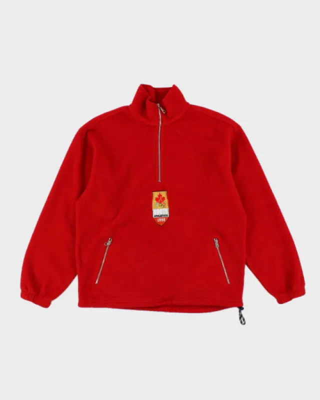 Vintage 1990's Roots Olympics Quarter Zip Fleece - M sold by Rokit