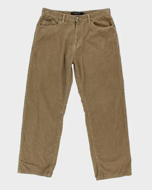 Vintage Calvin Klein Baggy Corduroy Trousers - W32 L28 sold by Rokit