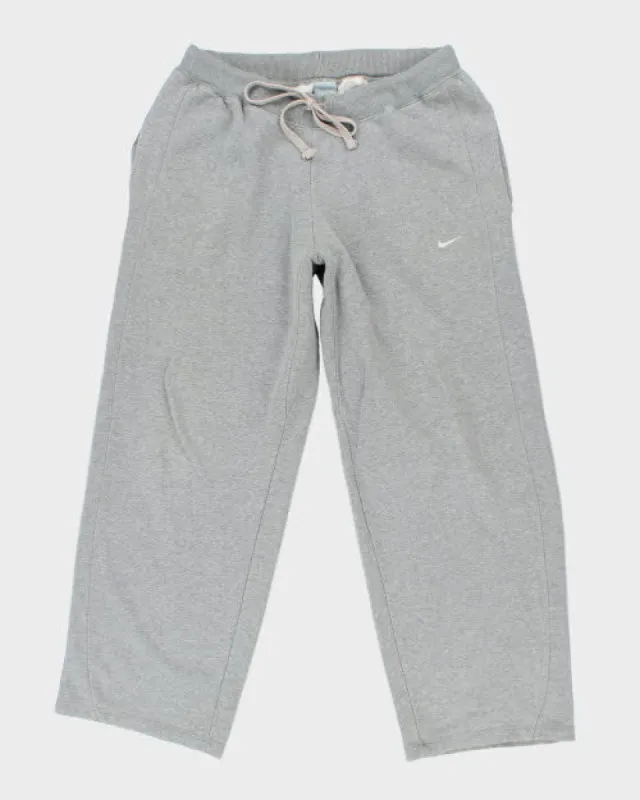 Vintage Nike Wide Leg Track Suit Bottoms - L sold by Rokit