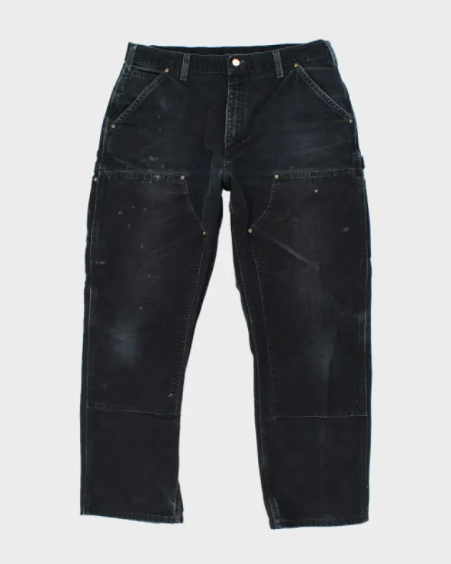 Vintage Carhartt Relaxed Fit Double Knee Carpenter Trousers - W34 L28 sold by Rokit