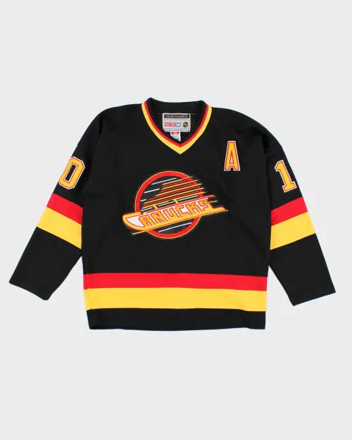 Vintage 90's CCM Vancouver Canucks NHL Hockey Jersey - M sold by Rokit