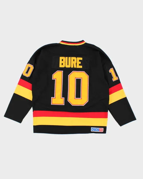 Vintage 90's CCM Vancouver Canucks NHL Hockey Jersey - M sold by Rokit product image thumbnail 2