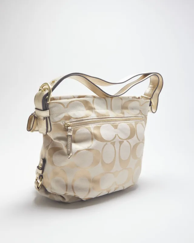 Coach Gold Monogram Handbag sold by Rokit