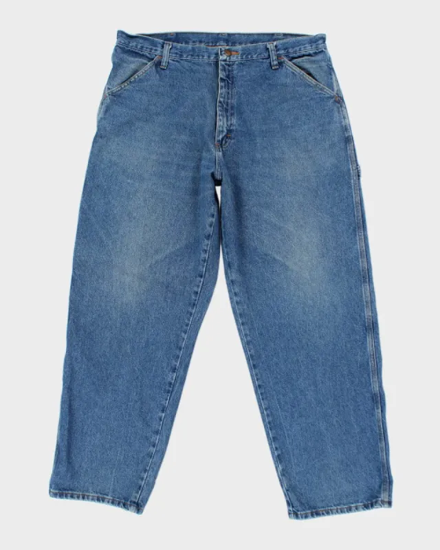 Vintage Y2K Baggy Fit Medium Wash Jeans - W34 L29 sold by Rokit