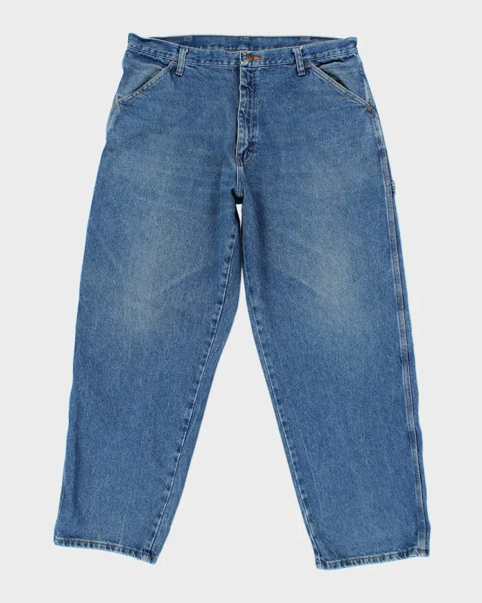 Vintage Y2K Baggy Fit Medium Wash Jeans - W34 L29 sold by Rokit