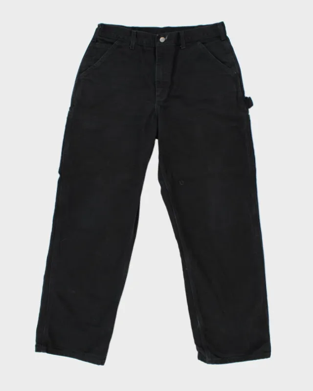 Vintage Carhartt Workwear Heavyweight Carpenter Trousers - W34 L29 sold by Rokit