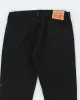 Vintage 90's Levi's 501 Black Dark Wash Jeans - W32 L30 sold by Rokit