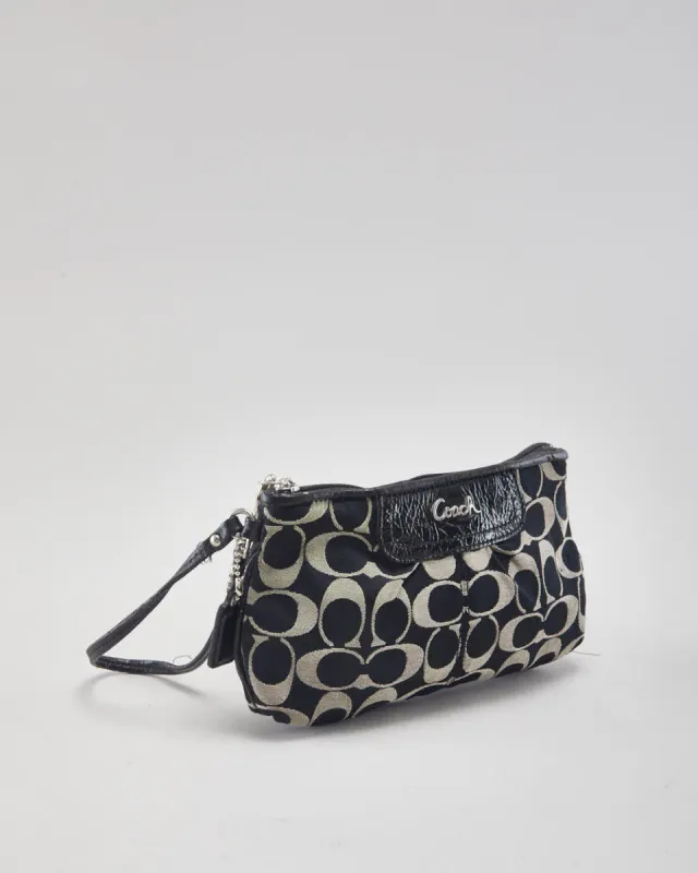 Coach Monogram Clutch sold by Rokit
