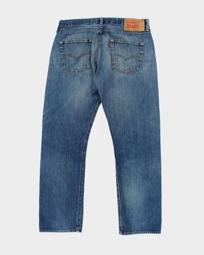 Vintage 90's Levi's 501 Medium Wash Jeans - W34 L28 sold by Rokit product image thumbnail 2