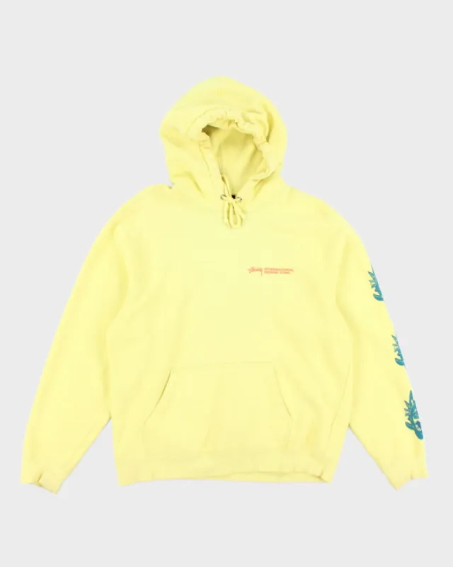 Vintage Stussy International Graphic Hoodie - M sold by Rokit