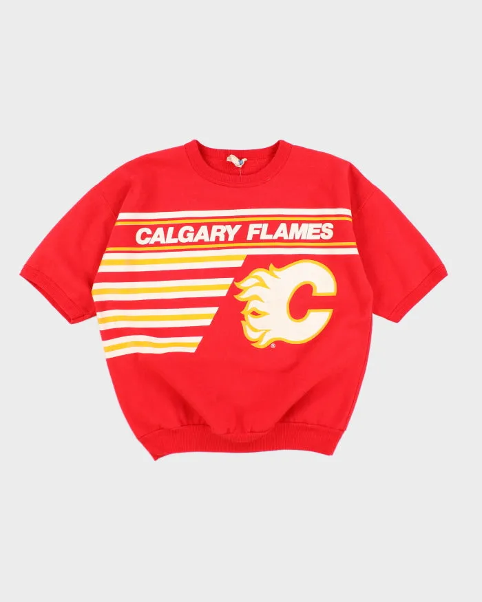 Vintage 90's NHL Calgary Flames Short Sleeve Sweatshirt - L sold by Rokit