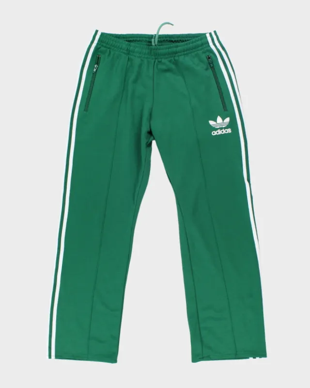 Vintage Adidas Three Stripe Slim Tracksuit Bottoms - M sold by Rokit
