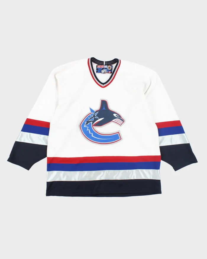 Vintage CCM Vancouver Canucks NHL Sports Jersey - XL sold by Rokit