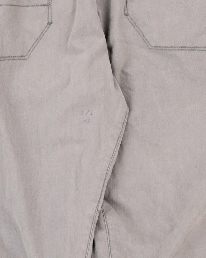 Vintage Women's The North Face Multi Pocket Cargo Hiking Trousers - W34 L30 sold by Rokit product image thumbnail 3