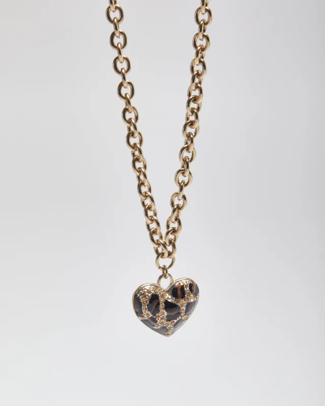 Guess Heart Necklace sold by Rokit