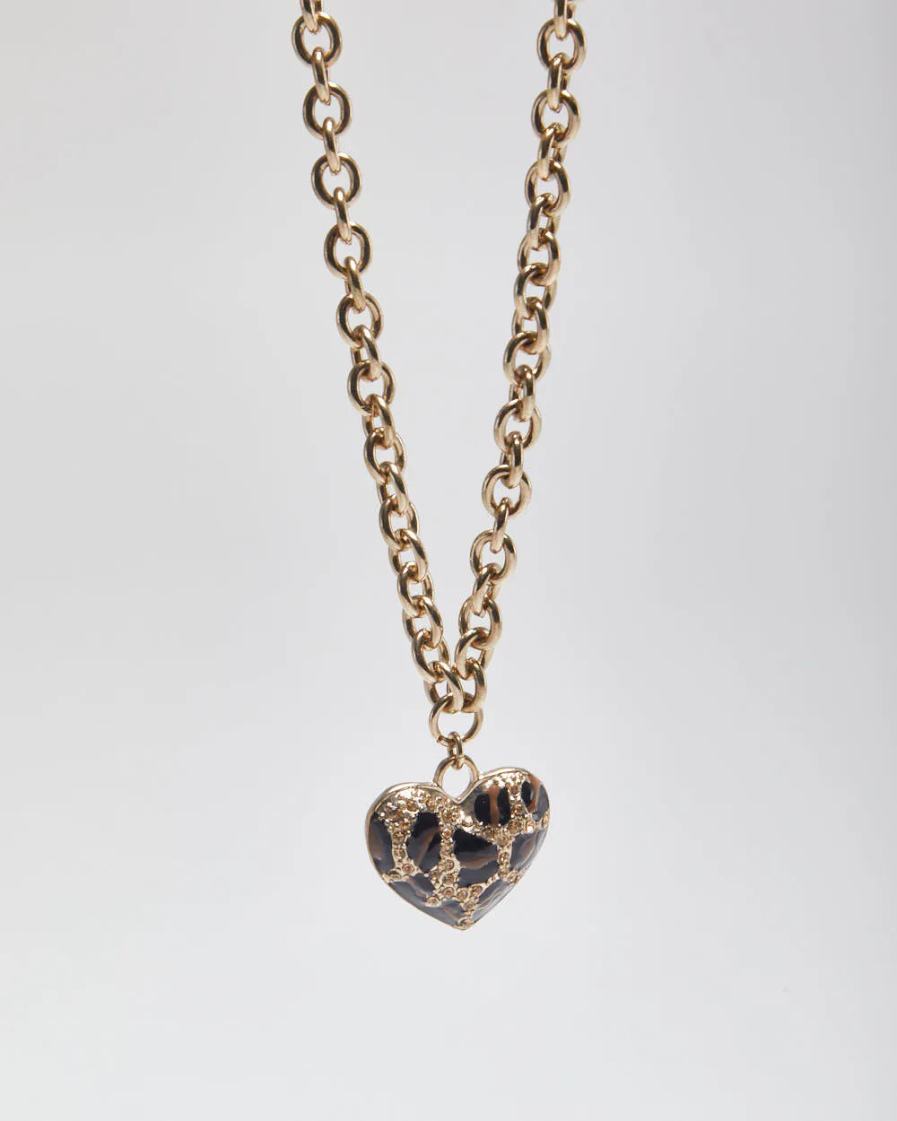 Guess Heart Necklace sold by Rokit