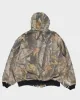 Vintage 90's Carhartt Real Tree Camo Hooded Heavyweight Active Jacket - XL sold by Rokit