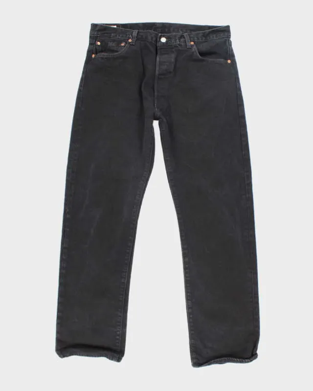 Vintage Levi's 501 Black Dark Wash Denim Jeans - W34 L30 sold by Rokit