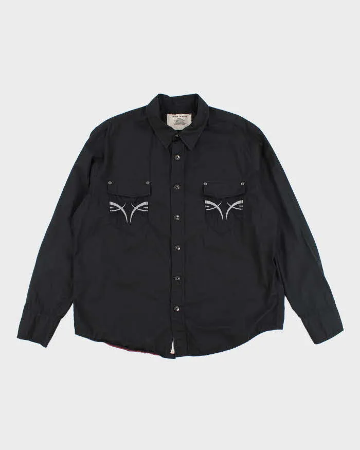 Vintage Y2K DKNY Tribal Embroidered Snap Button Shirt - XL sold by Rokit