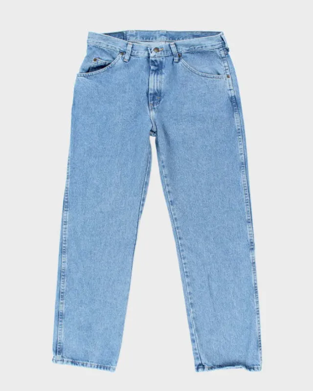 Vintage 2000's Wrangler Relaxed Fit Light Wash Jeans - W32 L28 sold by Rokit