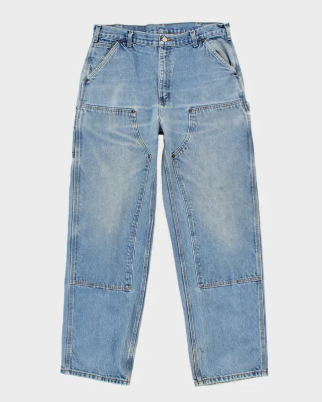 Vintage 90s Carhartt Double Knee Workwear Light Wash Jeans - W36 L33 sold by Rokit