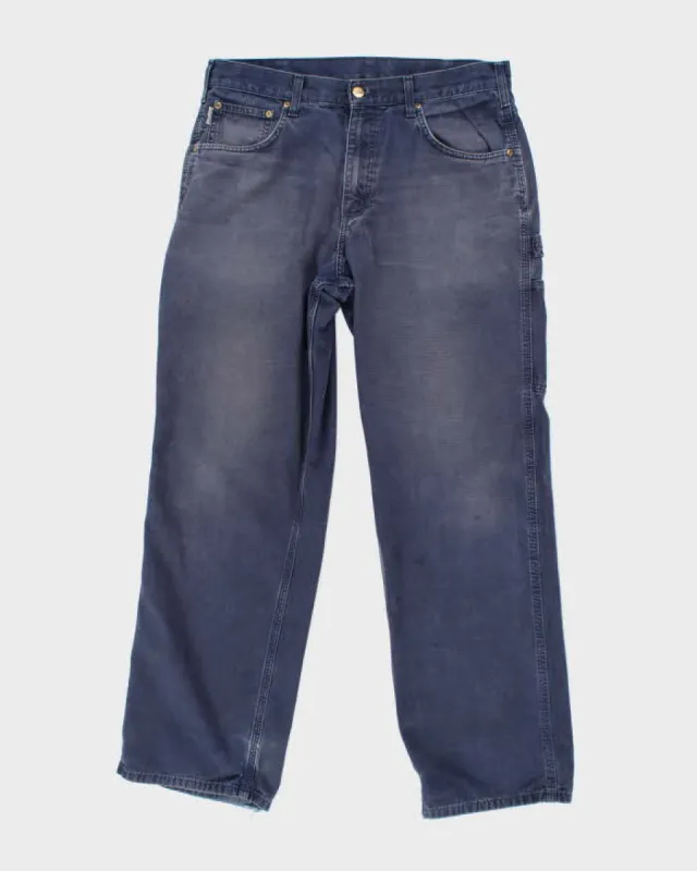 Vintage 2000's Carhartt Heavyweight Single Knee Workwear Trousers - W34 L30 sold by Rokit
