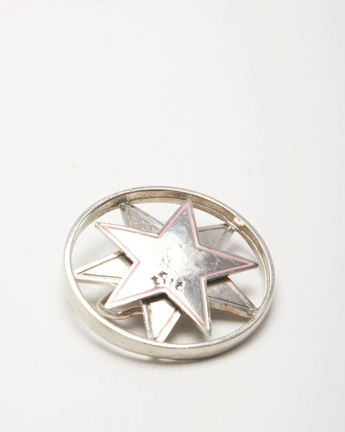 Y2k 00s Tilt Spin Star Belt Buckle sold by Rokit