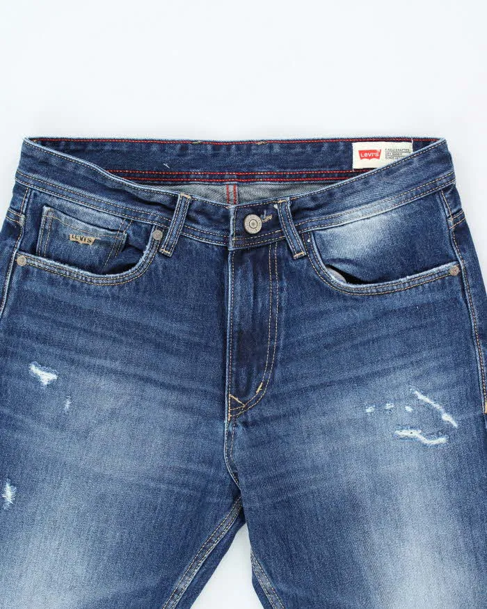Vintage Levi's 513 Pre-Distressed Straight Fit Dark Wash Jeans - W32 L29 sold by Rokit product image thumbnail 3