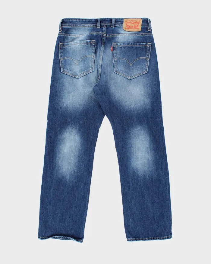 Vintage Levi's 513 Pre-Distressed Straight Fit Dark Wash Jeans - W32 L29 sold by Rokit product image thumbnail 2