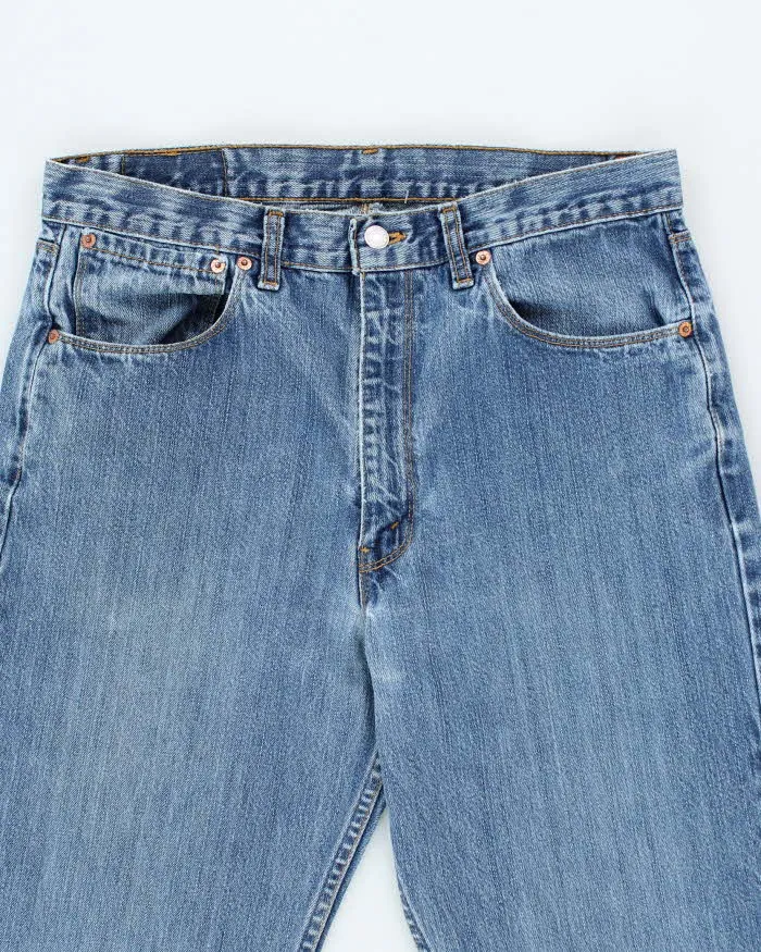 Vintage Levi's Regular Fit Medium Wash Jeans - W34 L32 sold by Rokit product image thumbnail 3