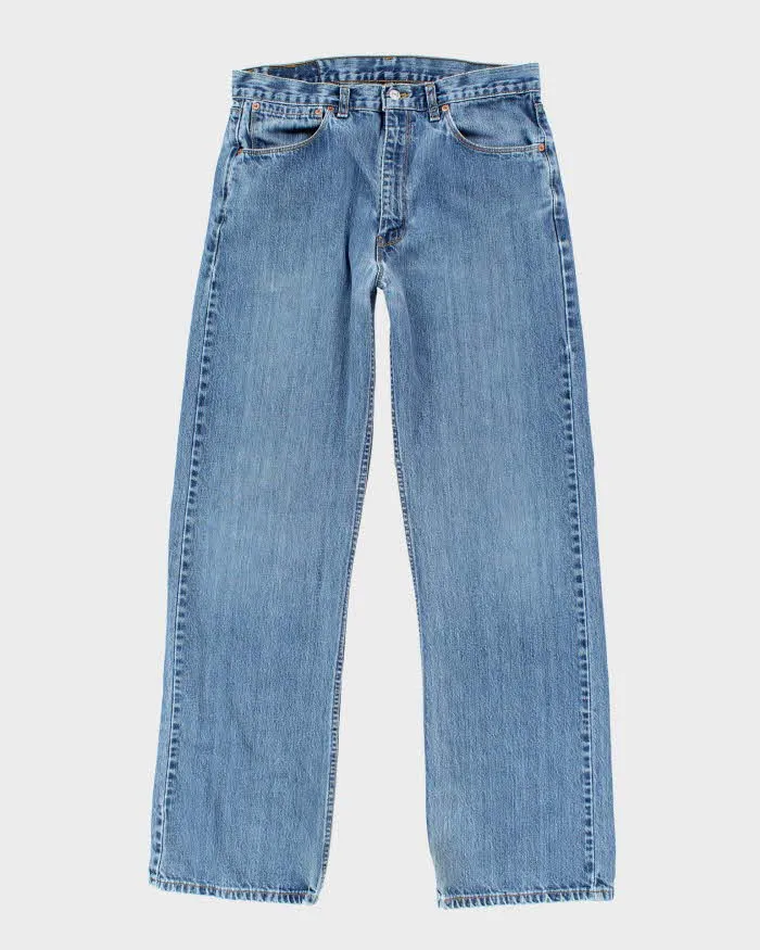 Vintage Levi's Regular Fit Medium Wash Jeans - W34 L32 sold by Rokit