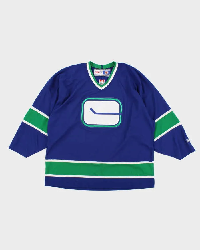Vintage Mens NHL x Canucks Blue Jersey - XL sold by Rokit