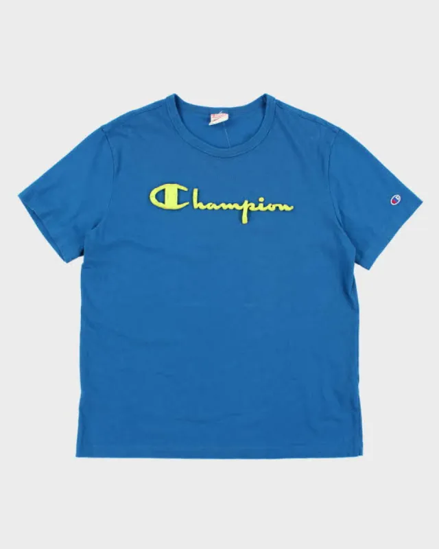 Vintage 2000's Champion Puff Print Graphic T-Shirt - XL sold by Rokit