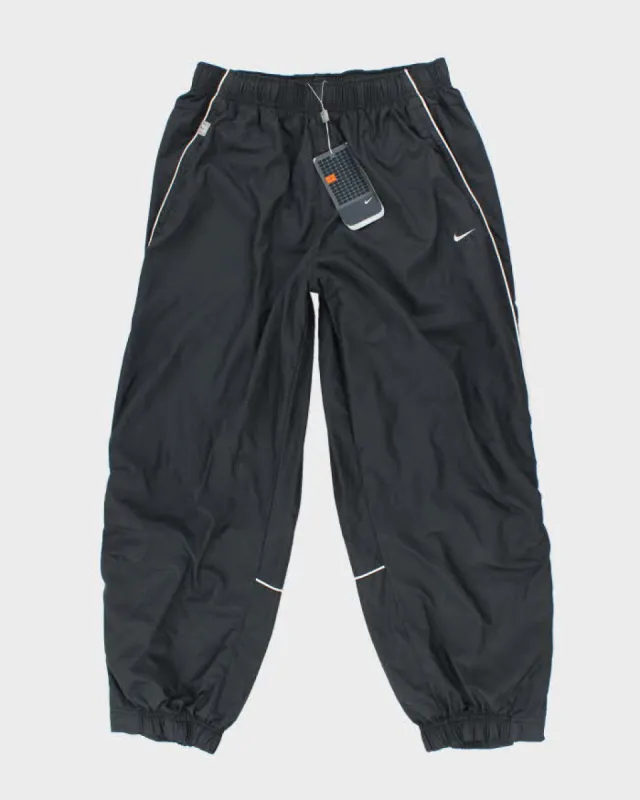 Vintage 2000's DSWT Nike Lightweight Tracksuit Bottoms - W32 L25 made by Nike
