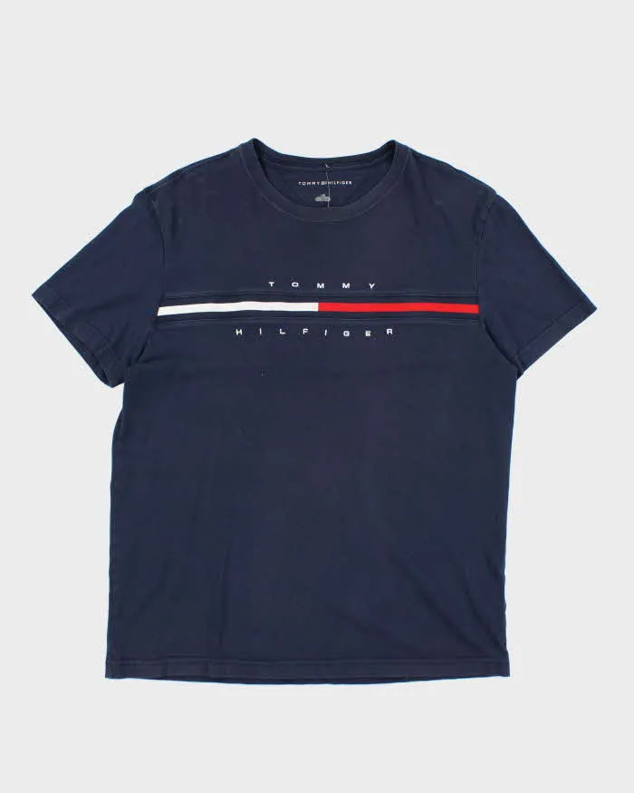 Vintage Tommy Hilfiger Flag Spell Out Graphic T-Shirt - L sold by Rokit