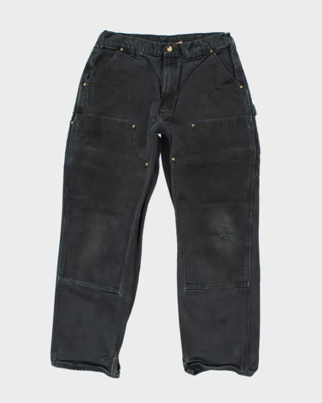Vintage 90's Carhartt Heavyweight Faded Double Knee Carpenter Trousers - W30 L30 sold by Rokit